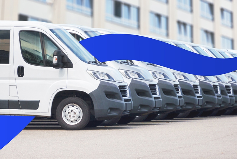 White delivery vans in a row